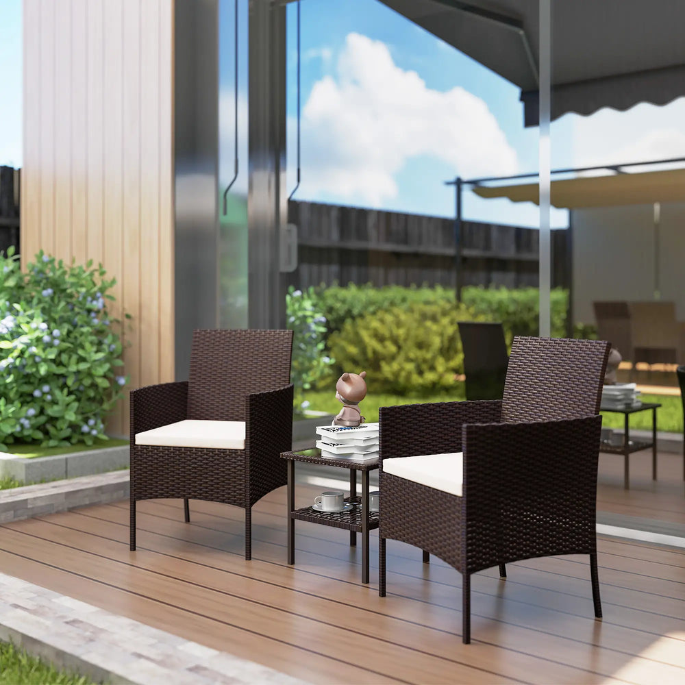 Ensemble de bistrot extérieur noir en métal avec table ronde et deux chaises sur terrasse ensoleillée