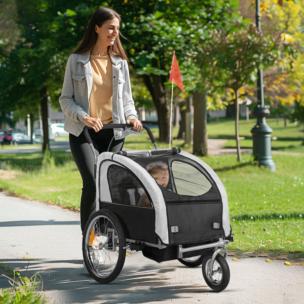 2-in-1 bike trailer with 5-point harness, rubber wheels, storage bag, black