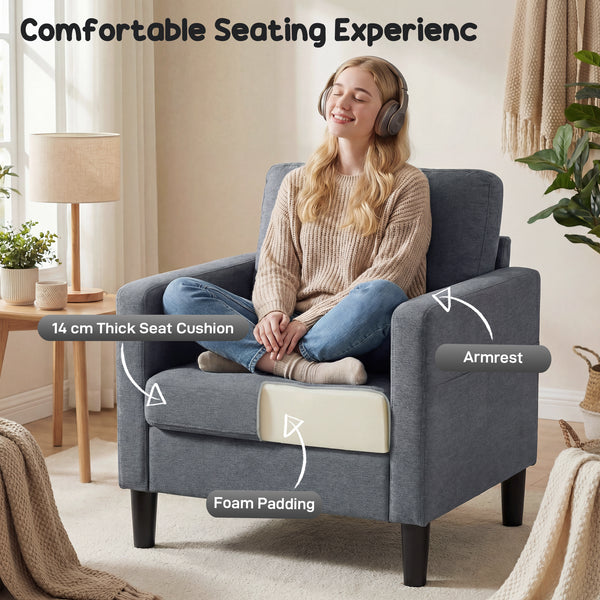 Modern upholstered armchair with thick, padded seat and armrests, dark grey 