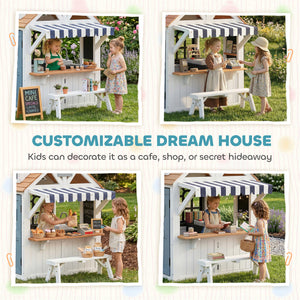 Wooden playhouse for children with cat flap, kitchen utensils, blackboard, bench, and doorbell