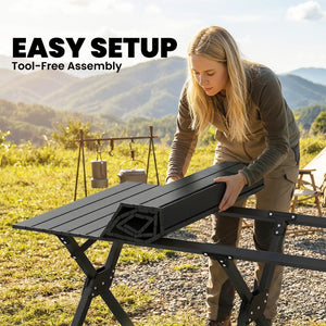 Waterproof foldable camping table with roll-up top and metal frame, black