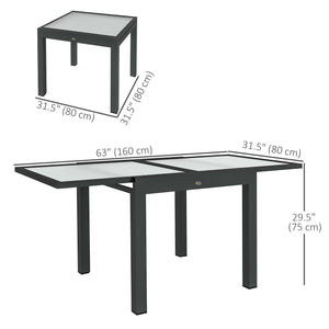 Extendable dining table in aluminum and tempered glass