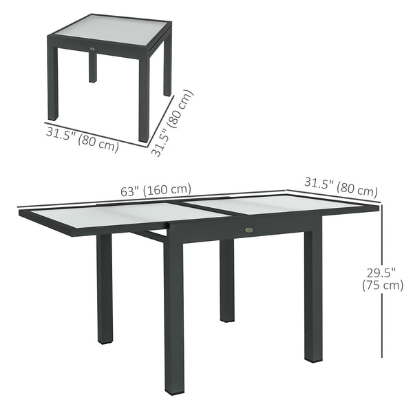 Extendable dining table in aluminum and tempered glass