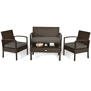 Set of 4 upholstered rattan patio furniture pieces - brown