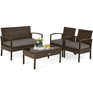 Set of 4 upholstered rattan patio furniture pieces - brown