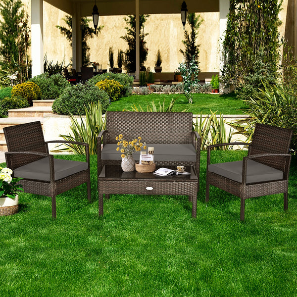Set of 4 upholstered rattan patio furniture pieces - brown