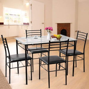 5-piece dining table with glass top and 4 upholstered chairs