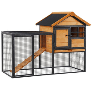 Outdoor hutch with run, sturdy metal frame, asphalt roof, and access ramp
