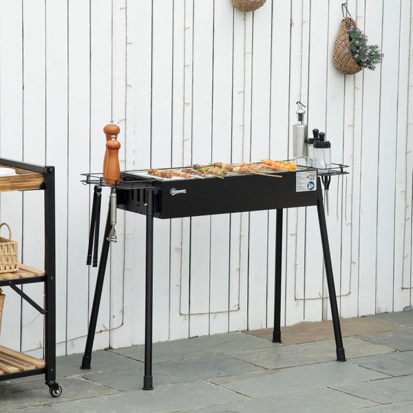 Charcoal barbecue with side spice baskets, hooks and nets, black