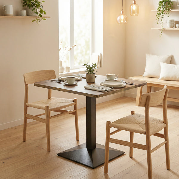 Square dining table with steel base, compact and space-saving, walnut-look.