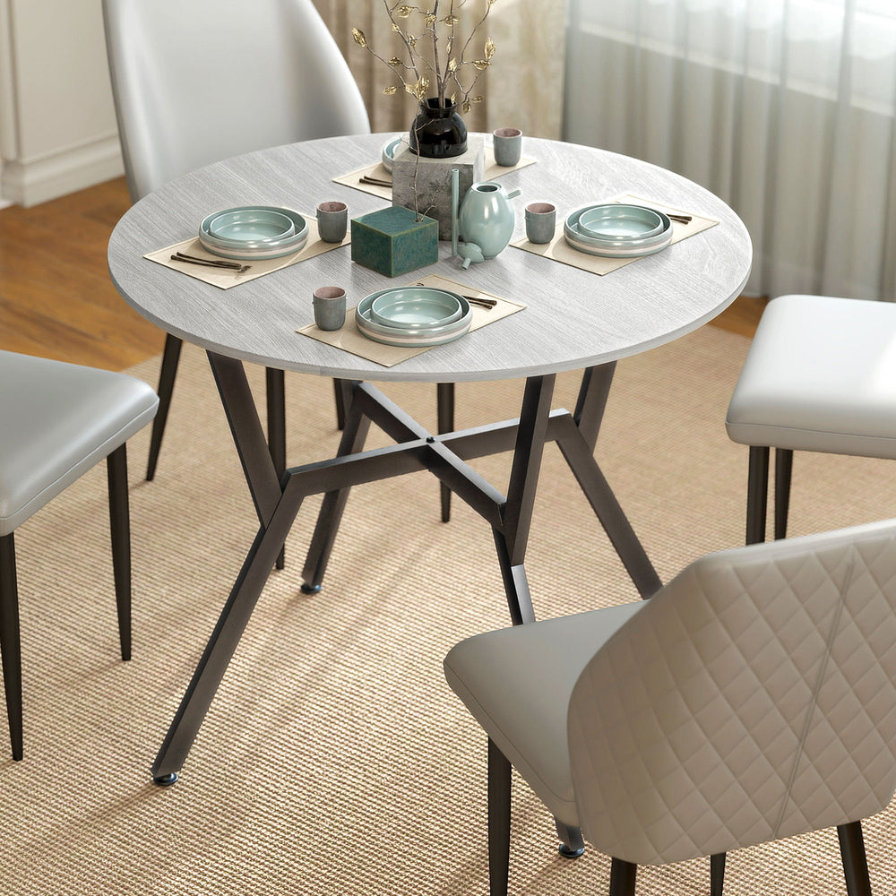Modern round dining table with steel frame, grey