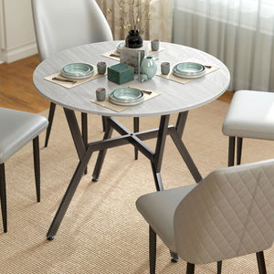 Modern round dining table with steel frame, grey