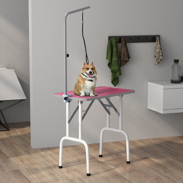 Folding grooming table with adjustable arm and non-slip surface, pink