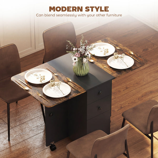 Drop-leaf dining table on casters with drawers and cupboard, rustic brown and black.