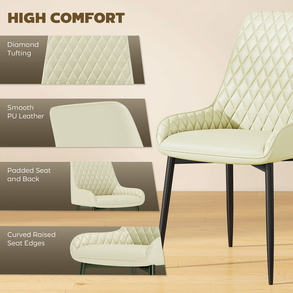 Set of 4 upholstered kitchen chairs, cream color.