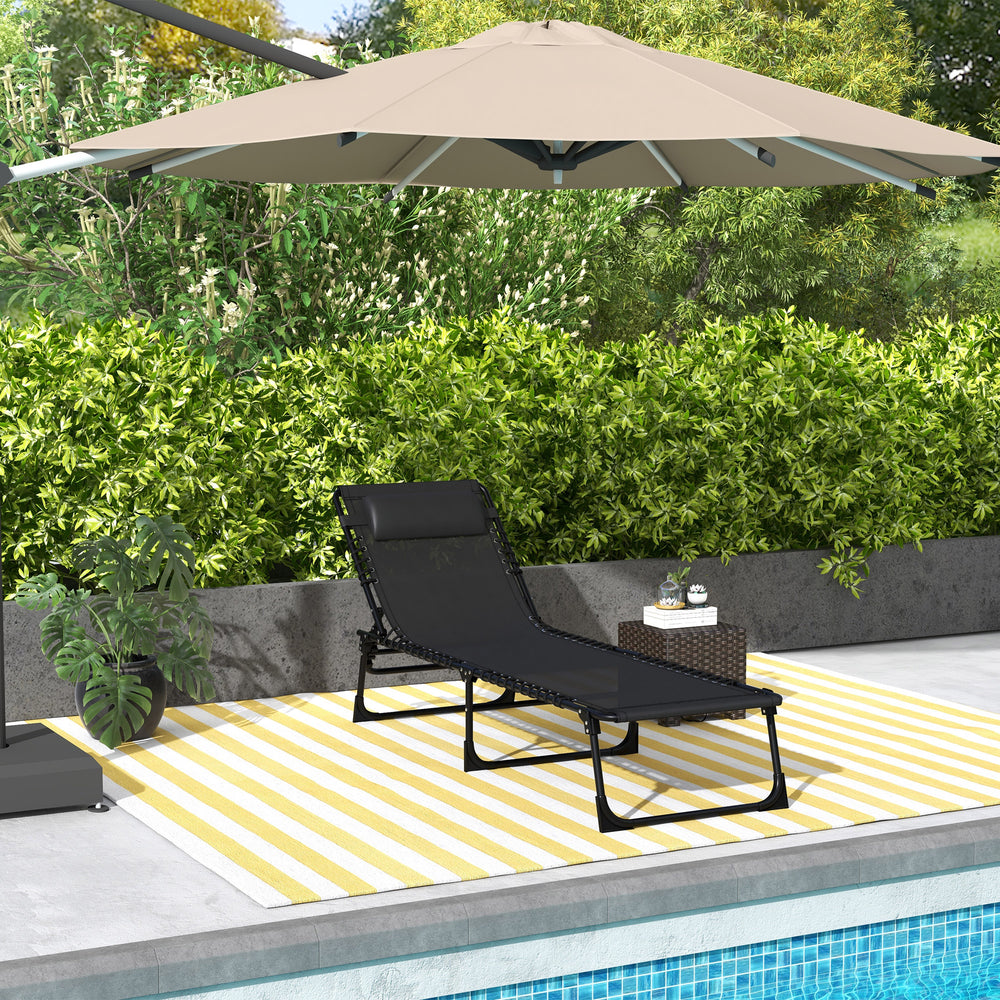 Black outdoor folding chaise lounge, adjustable to 4 positions with headrest.