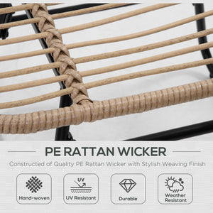 Rattan armchair with footrest