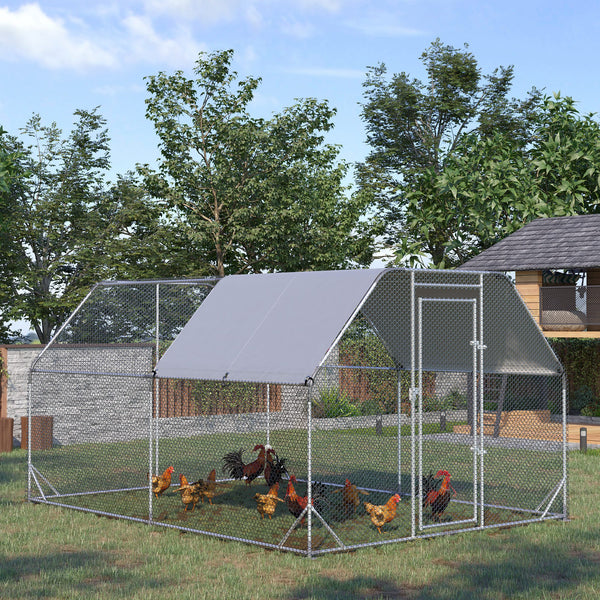 Galvanized metal chicken coop with flat roof and tarp
