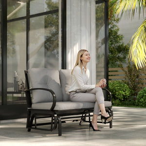 Two-seater rocking chair with steel frame and cushions, grey