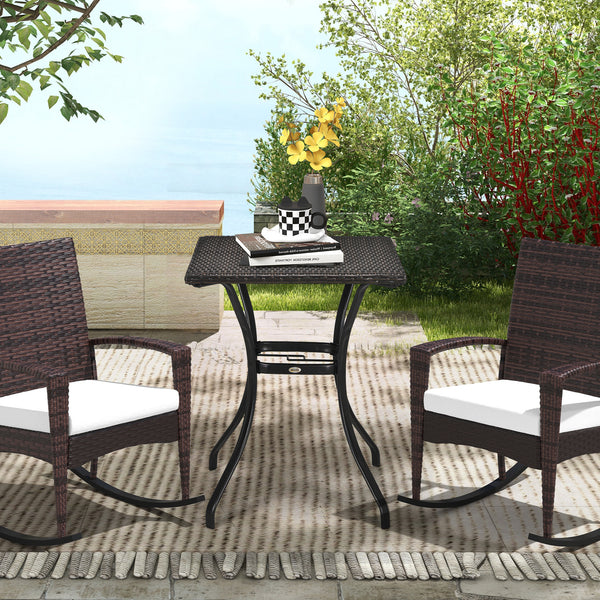 Outdoor coffee table in woven resin with a hole for a parasol, brown