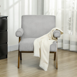 Corduroy accent chair with wide seat and padded armrests, light grey