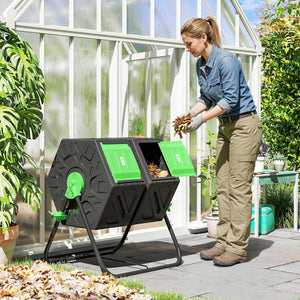 Rotating double-chamber composter with 24 vents and steel legs, green