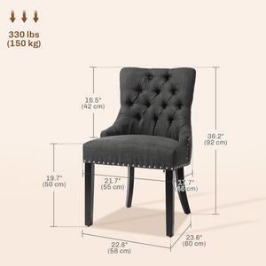 Set of 2 linen dining chairs with studded trim and wooden legs, dark grey