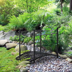 Classic garden bridge with safety railings, black