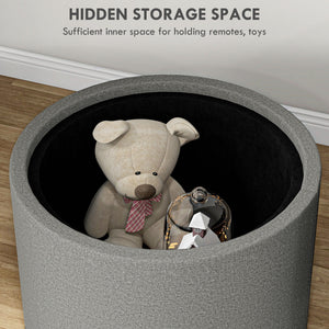 Round coffee table with hidden storage and gray linen upholstered top