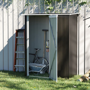 Metal garden shed with sloping roof and lockable door for tools, grey