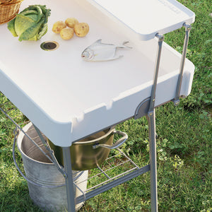 Folding cooler table with drainage system