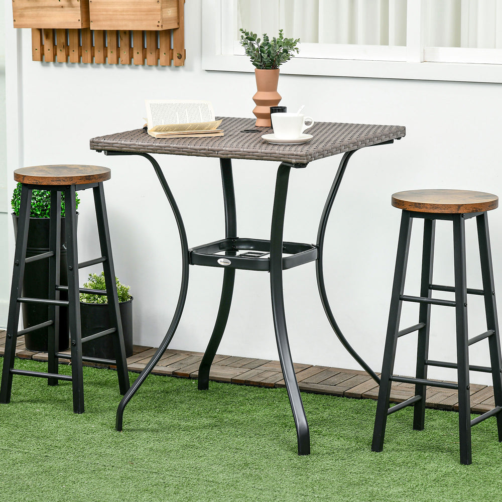 Outdoor coffee table in woven resin with a hole for a parasol, light grey