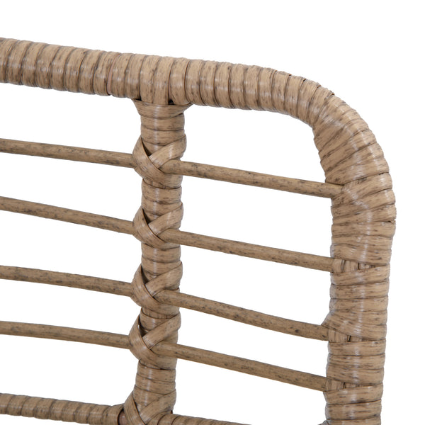 Rattan armchair with footrest