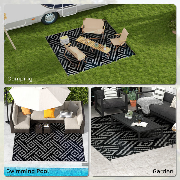 Reversible waterproof outdoor rug made of plastic straw, black and grey geometric pattern