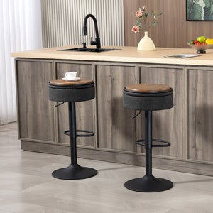 Set of 2 swivel bar stools with storage, faux leather upholstery, footrest, steel base, black
