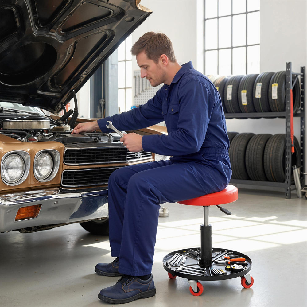 Adjustable mechanic's stool with casters and tool storage tray, red