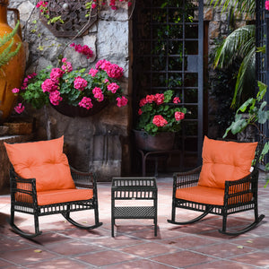 Bistro set with 2 PE rattan rocking chairs and a tempered glass table