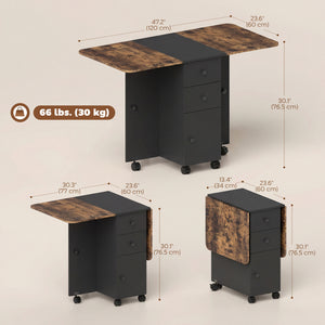 Drop-leaf dining table on casters with drawers and cupboard, rustic brown and black.