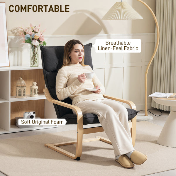 Upholstered accent chair with curved legs and armrests, dark gray