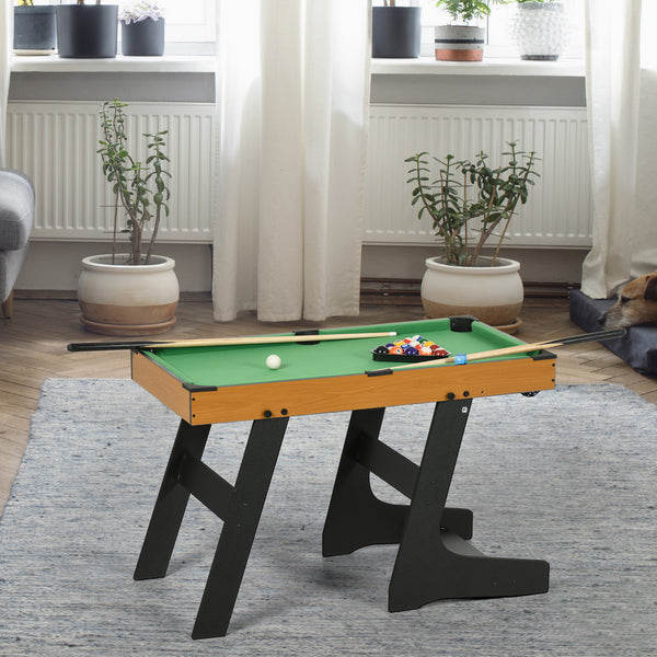 Mini foldable pool table with balls, cues, chalk and brush.