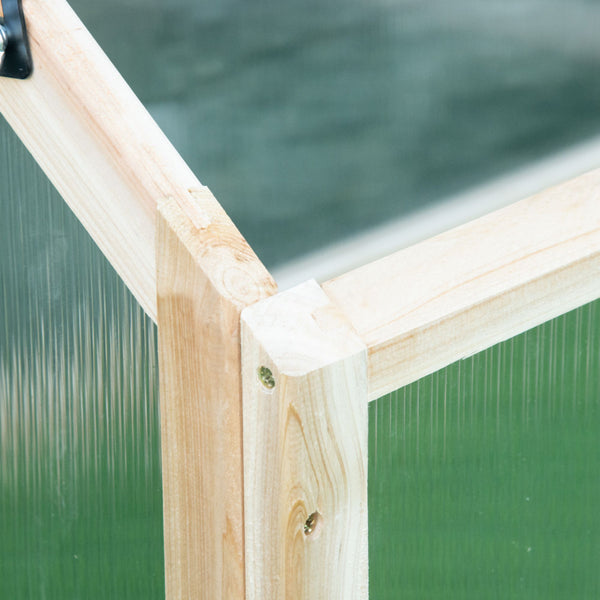 Portable raised garden greenhouse made of natural wood with a hinged lid