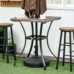 Outdoor coffee table in woven resin with a hole for a parasol, light grey