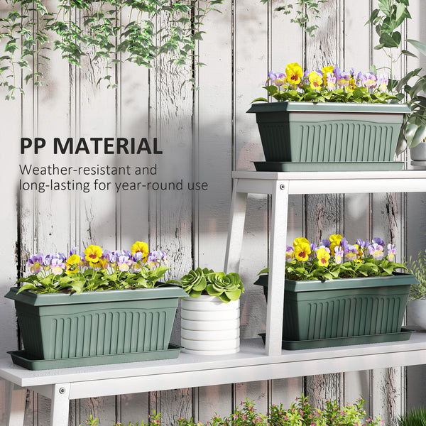 Set of 7 plastic flower pots with drainage holes and saucers
