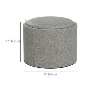 Round coffee table with hidden storage and gray linen upholstered top