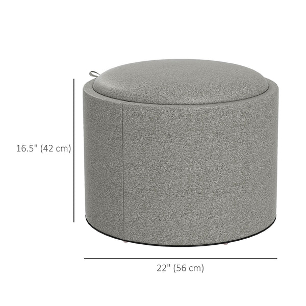 Round coffee table with hidden storage and gray linen upholstered top