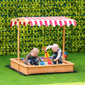 Wooden sandbox with height-adjustable lid, floor liner, seat and plastic trays