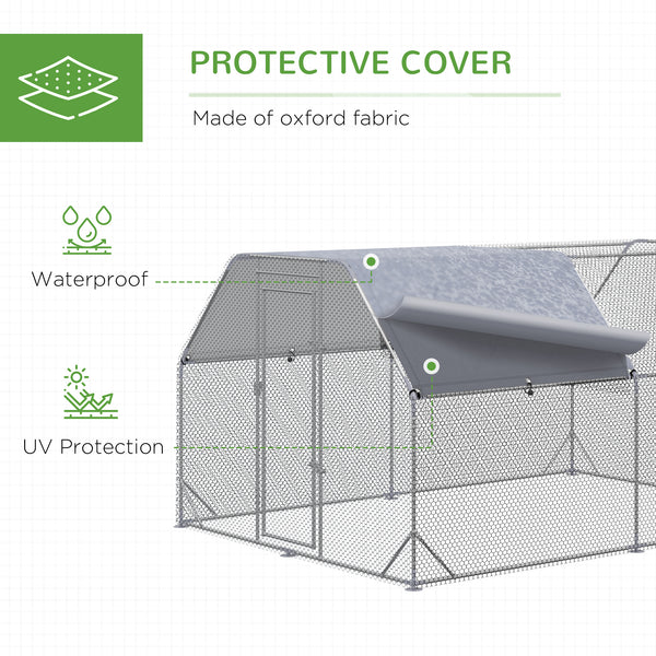 Galvanized metal chicken coop with flat roof and tarp