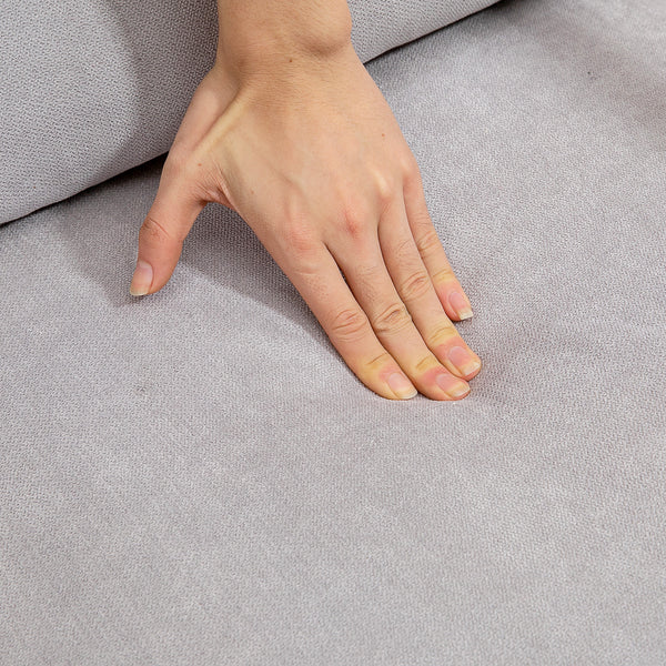 Fabric lounge chair with wooden legs and thick padding, gray