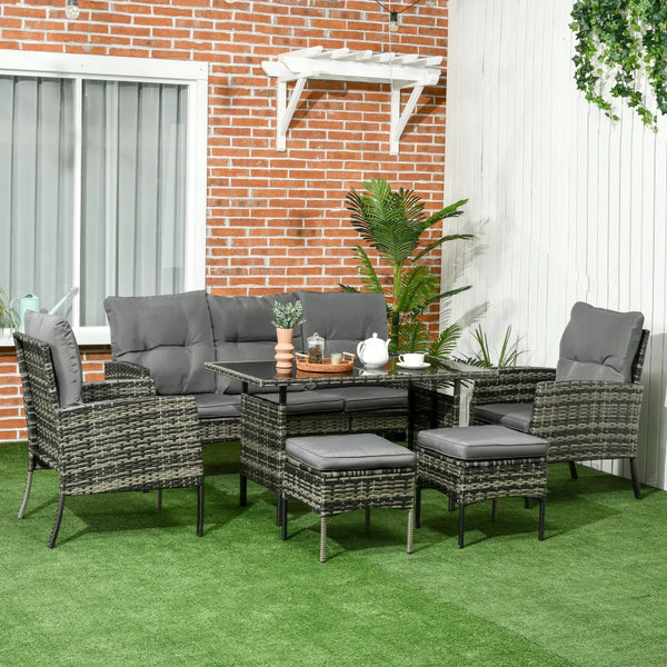 Ensemble de meubles de jardin 6 pièces gris incluant canapé, chaises, poufs, table avec plateau en verre et coussins, idéal pour espace extérieur moderne

