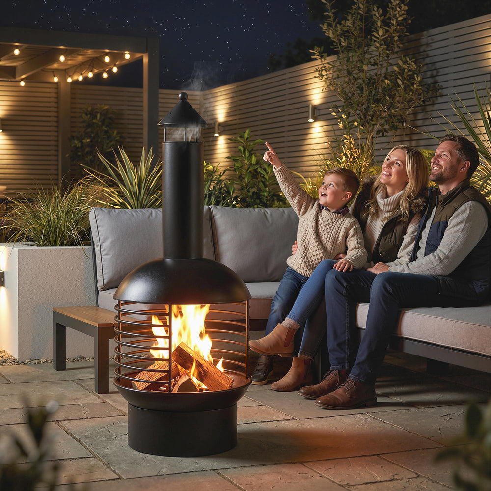 Wood-burning outdoor fireplace with poker, charcoal grate, modern design chimney, black